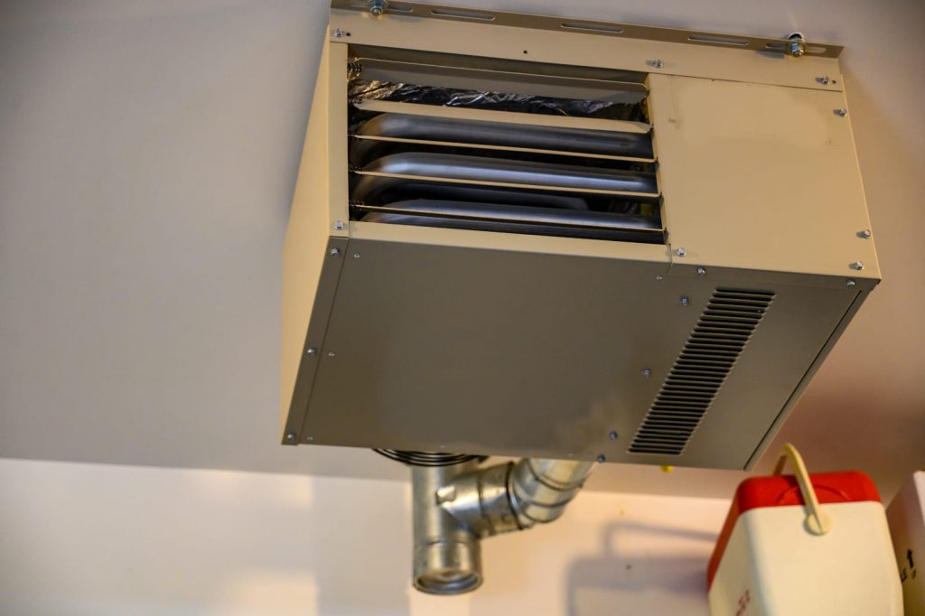 A ceiling mounted garage heater