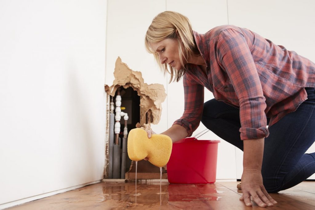 What to do when a pipe bursts? Call a professional after attempting to clean up some of the wet spots.