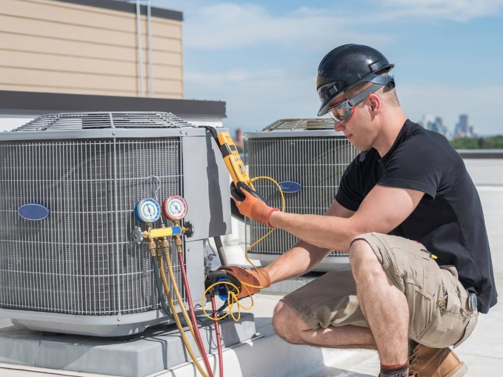 Does you HVAC need a tune-up? High energy bills or dusty filters are huge signs. Am HVAC tech repairs a roof AC unit.