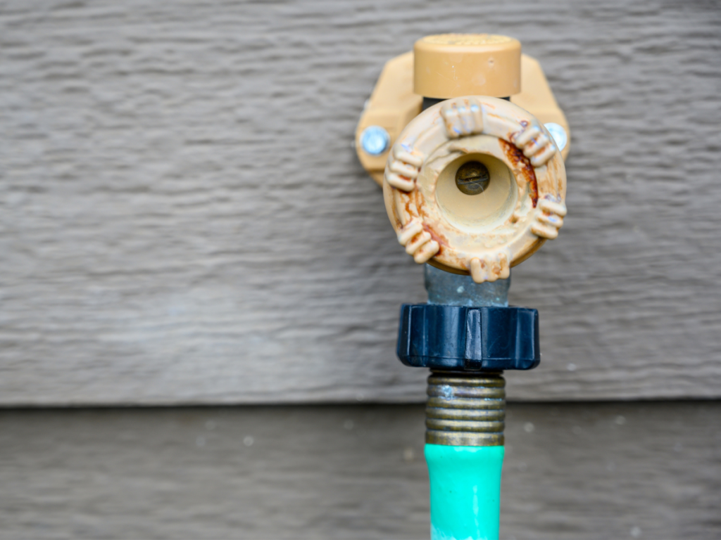 Learn how to winterize your pipes before the cold damages them beyond repair. An outdoor water hose.